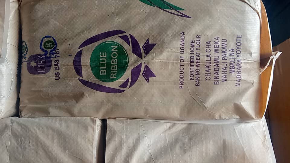 Loaf of bread next to flour